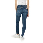 Back side view of guess women’s dark blue slim fit denim jeans with worn-out effect and pink logo on pocket