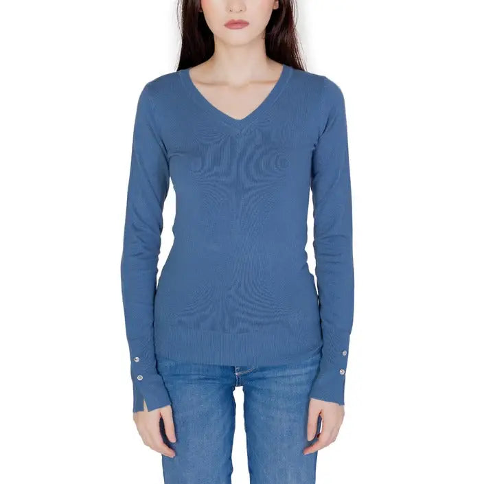 Guess Women Knitwear: Blue long-sleeved V-neck sweater styled with jeans
