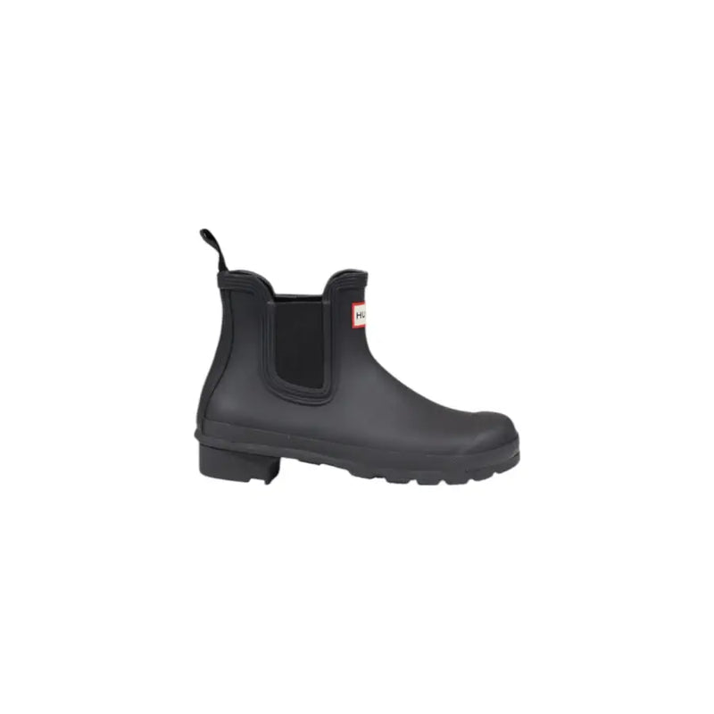 Hunter black rubber ankle boot with red and white logo on the side made of durable rubber for women
