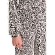 A cozy long-sleeved loungewear set in black and white textured fabric with abstract zebra-stripe pattern from ichi women