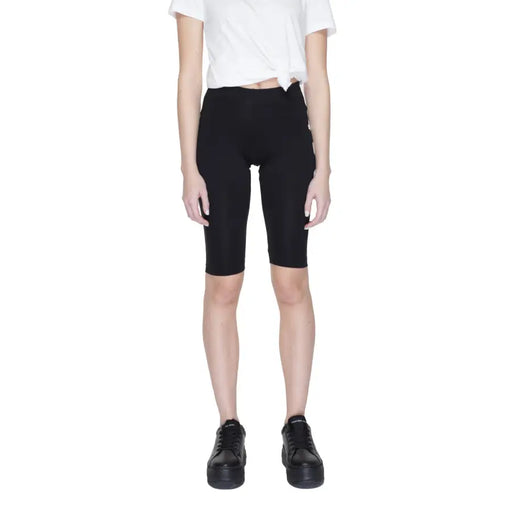 Icon men black cotton slip-on shorts featuring high-waisted black biker shorts with smooth, form-fitting fabric and subtle side seams