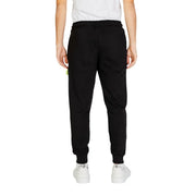 Black jogger pants with drawstring waistband and ribbed cuffs from Icon men laced printed trousers for fall winter
