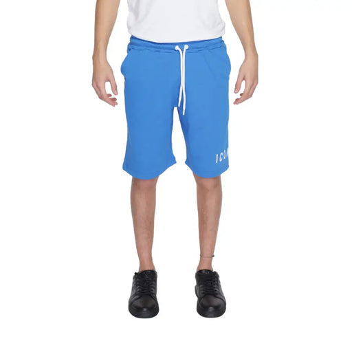 Bright blue cotton shorts for men with white drawstrings and subtle icon logo on left leg in light blue color