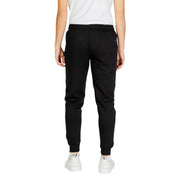Black icon men trousers joggers made of soft stretchy fabric with subtle brand logo on the back waistband