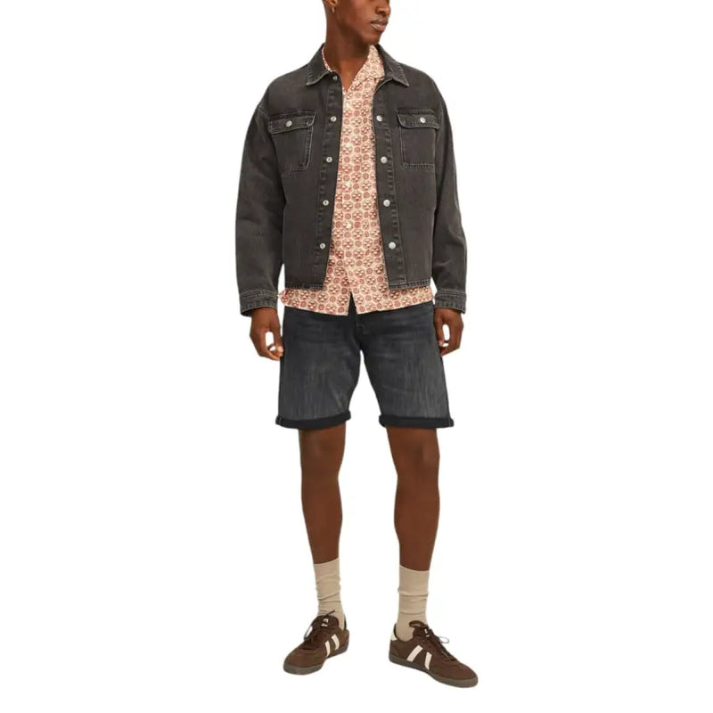 Dark-wash denim jacket with buttoned chest pockets and collar paired with jack & jones black cotton blend men shorts