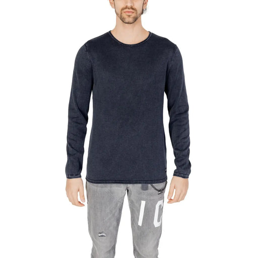 Navy blue long-sleeved thermal shirt with ribbed cuffs and hem, likely made of polyester or cotton blend.