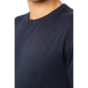 Navy blue crew neck t-shirt with ribbed neckline and cuffs, made of cotton.