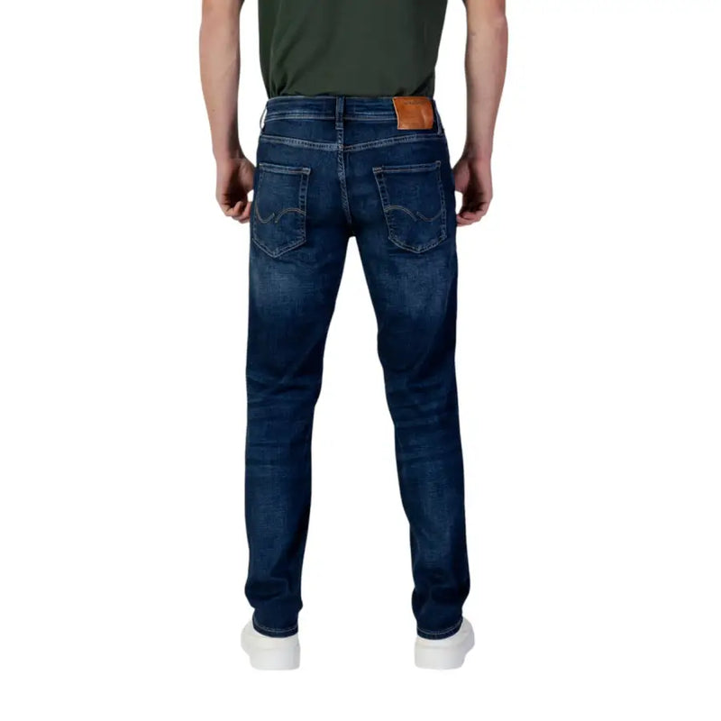 Dark blue jack & jones classic fit jeans with organic cotton stretch and brown leather branding on the waistband back side