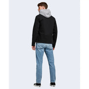 Black hooded jacket with gray fleece-lined hood shown from the back paired with jack and jones men blue 100 percent cotton jeans