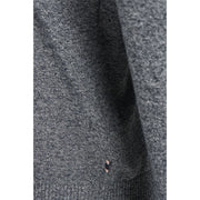 A close-up of Jack and Jones men knitwear dark gray textured cotton fabric with subtle speckles and ribbed edge
