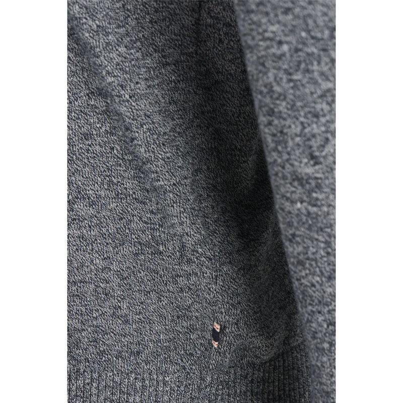 A close-up of Jack and Jones men knitwear dark gray textured cotton fabric with subtle speckles and ribbed edge