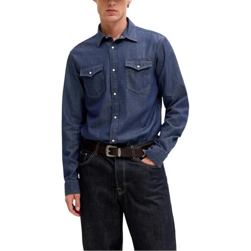 Dark blue denim long-sleeved shirt with buttoned chest pockets and classic collar by Jack Jones for men