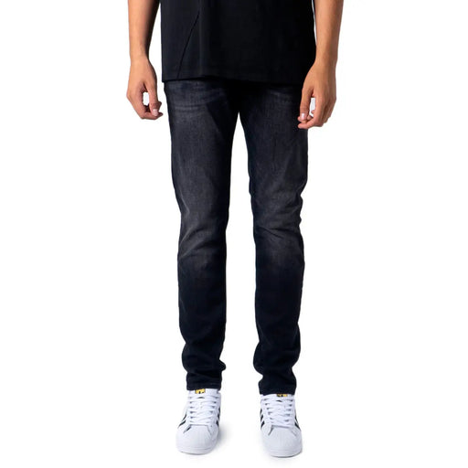 Jack and jones men’s black slim-fit denim jeans with faded wash and subtle whiskering for fall winter wear