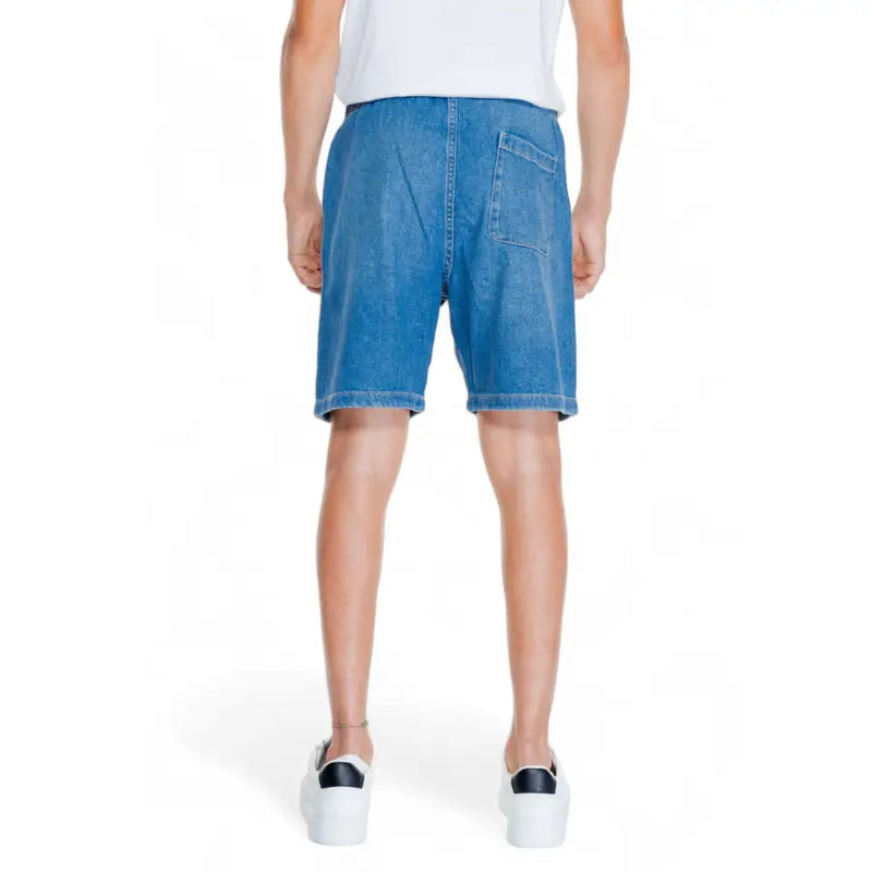 Jack & Jones men’s blue cotton denim shorts with five-pocket design and rolled cuffs from spring summer collection