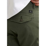 Jack & Jones men’s olive green cotton chino pants with pockets black button and brand label visible