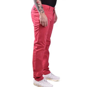 Men’s slim-fit red cotton trousers paired with white sneakers from Jacob Cohen