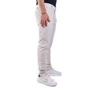 Men’s light beige slim-fit chinos with white sneakers from Jacob Cohen White collection