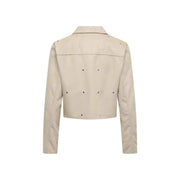Beige cropped leather jacket with silver studs on shoulders back and sleeves for a stylish edgy look