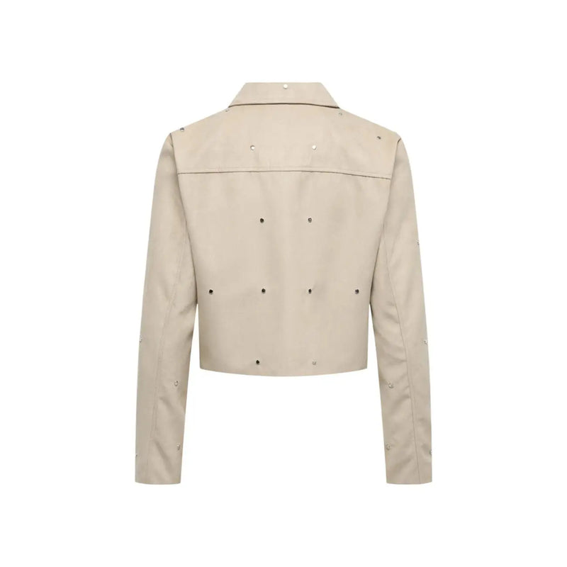 Beige cropped leather jacket with silver studs on shoulders back and sleeves for a stylish edgy look