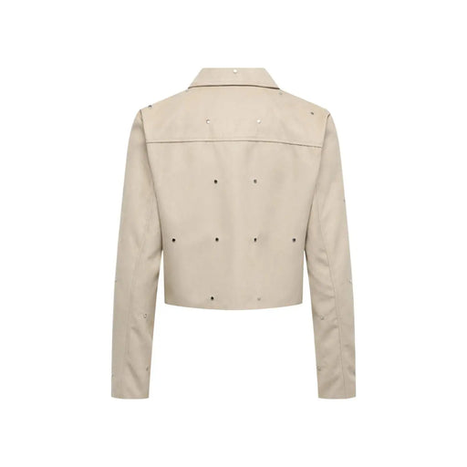 Beige cropped leather jacket with silver studs on shoulders back and sleeves for a stylish edgy look