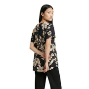 Jacqueline de yong black short-sleeved blouse with beige floral and leaf patterns for casual wear