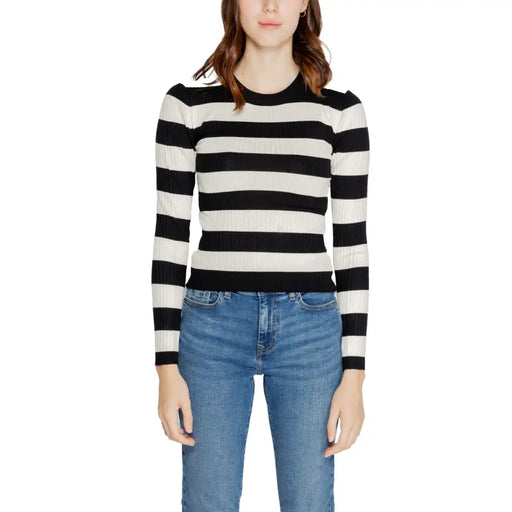 Jacqueline de yong black striped long sleeve knitwear featuring a ribbed knit fabric and round neckline