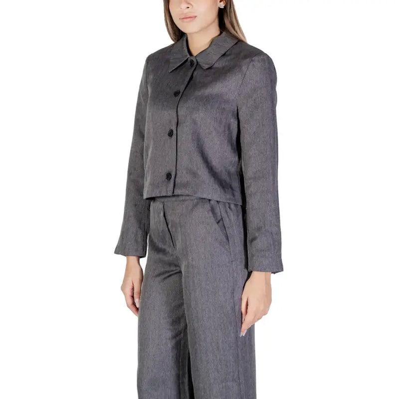 A sleek dark gray textured polyester blazer with classic collar and black buttons by Jacqueline De Yong for women