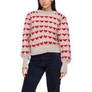 Jacqueline de Yong Damenpullover aus beigefarbenem Polyesterstrick mit kuscheligem, cremeweißem Strick und auffälligen roten Herzstreifen.