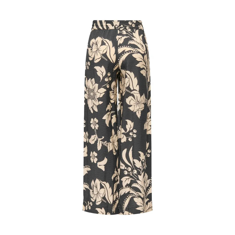 Schwarze Damenhose von Jacqueline de Yong aus Viskose mit floraler Spitze, weitem Bein, schwarzem und cremefarbenem Blumenmuster und fließender Silhouette