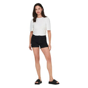 Jacqueline de yong women white eyelet short sleeve blouse paired with black denim shorts and platform sandals