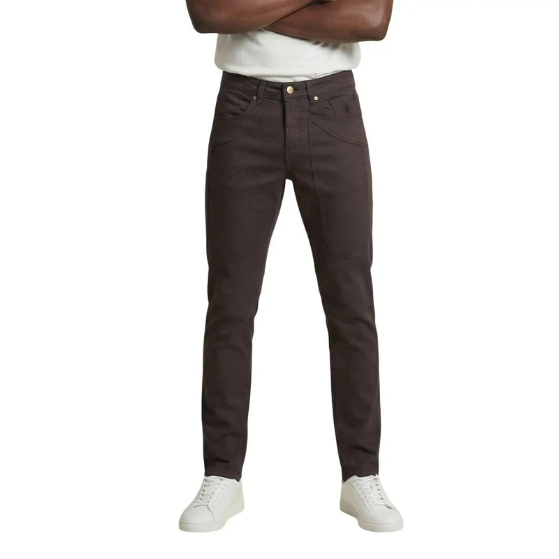 Dark brown slim-fit jeans with classic five-pocket design and subtle stitching details by jeckerson