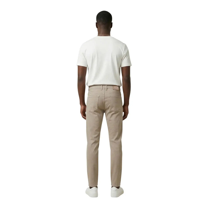 Beige slim fit chino trousers by jeckerson in a cotton blend pique fabric with subtle stitching details