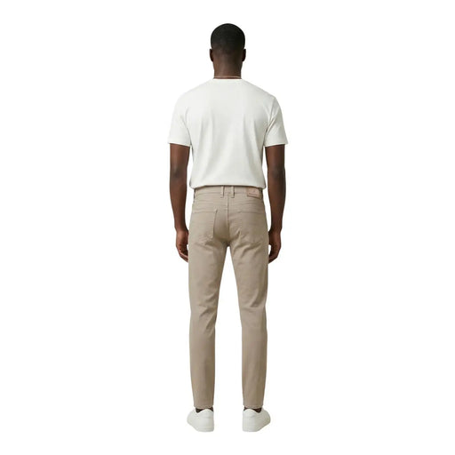 Beige slim fit chino trousers by jeckerson in a cotton blend pique fabric with subtle stitching details