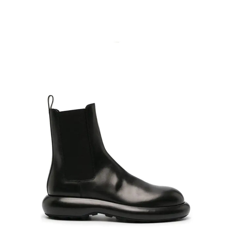 Jil Sander Herren Chelsea-Stiefelette aus schwarzem Leder mit dicker, glänzender Sohle und elastischen Seiteneinsätzen, Herbst-Winter-Kollektion