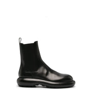 Jil sander men black leather chelsea ankle boot with chunky glossy sole and elastic side panels fall winter collection