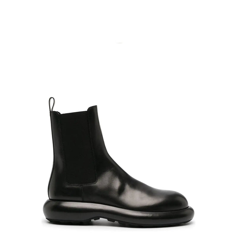 Jil sander men black leather chelsea ankle boot with chunky glossy sole and elastic side panels fall winter collection