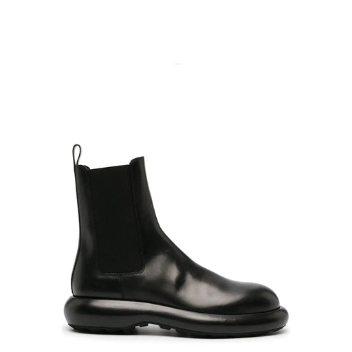 Jil sander men black leather chelsea ankle boot with chunky glossy sole and elastic side panels fall winter collection