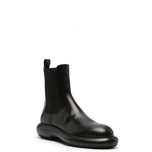 Schwarze Herren-Ankle-Boots aus Leder von Jil Sander mit dicker Sohle und elastischen Seiteneinsätzen aus der Herbst-/Winterkollektion