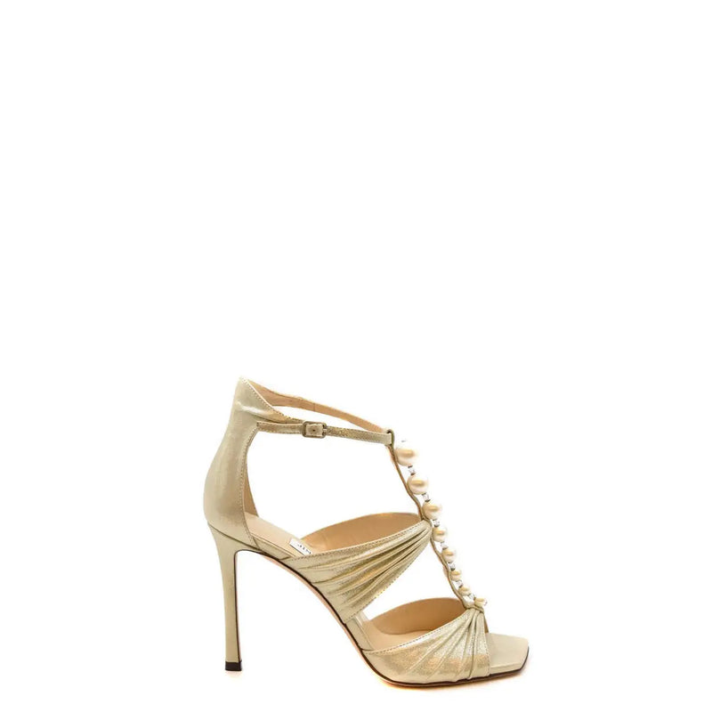 Jimmy Choo women leather sandals beige stiletto open toe with metallic gold high heel and pearl-adorned crisscross straps