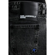 Black denim jeans with black leather karl lagerfeld patch and blue embroidered logo on pocket made from organic cotton