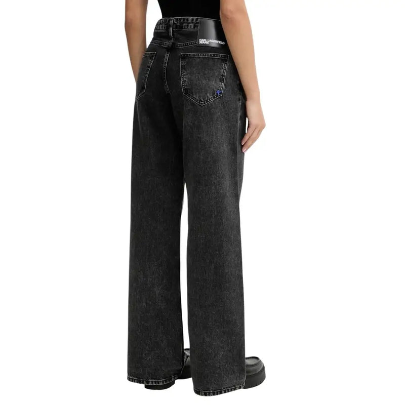 Back view of Karl Lagerfeld women’s black organic cotton wide-leg jeans with faded wash and white stitching