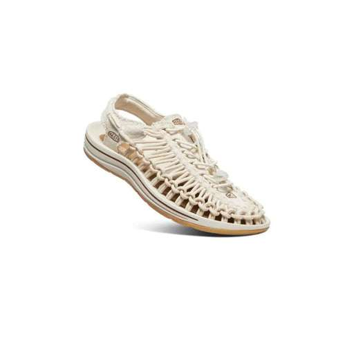 Keen women beige slip on flat sandal with cream woven leather braided design and tan rubber sole