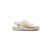 Keen women beige sandals slip on flat with cream-colored woven leather braided design and tan rubber sole