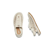 Keen women beige sandals slip on flat with cream-colored woven leather braided design and tan rubber sole