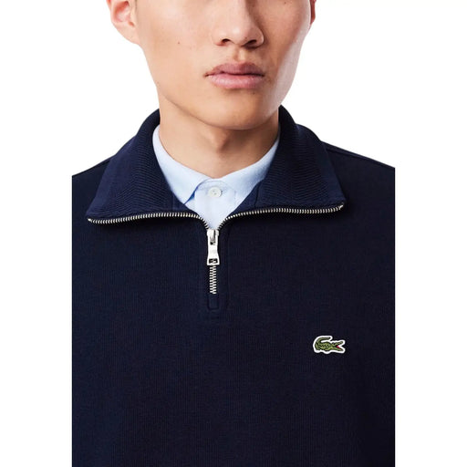 Blaues Lacoste Herren-Sweatshirt aus Baumwolle mit Rollkragen, marineblauem Rippstrick-Halbreißverschluss und silbernem Reißverschluss mit grünem Krokodillogo