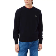 Schwarzer Lacoste-Pullover mit Rundhalsausschnitt, rotem Rippkragen und grünem Krokodillogo auf der linken Brust – Herrenstrickwaren