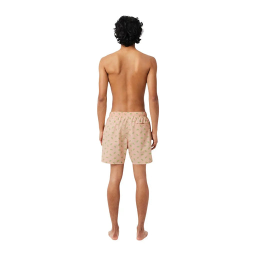 Beige lacoste men pink print polyester swimwear shorts with subtle green leaf pattern and elastic waistband