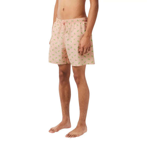Lacoste men pink polyester swimwear shorts with subtle green leaf pattern elastic waistband and drawstring closure