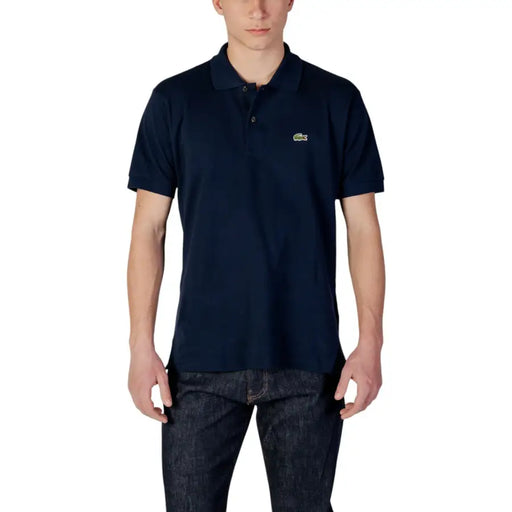 Marineblaues Lacoste Herren-Poloshirt mit kleinem grünen Krokodil-Logo aus kurzärmeligem Baumwollstoff