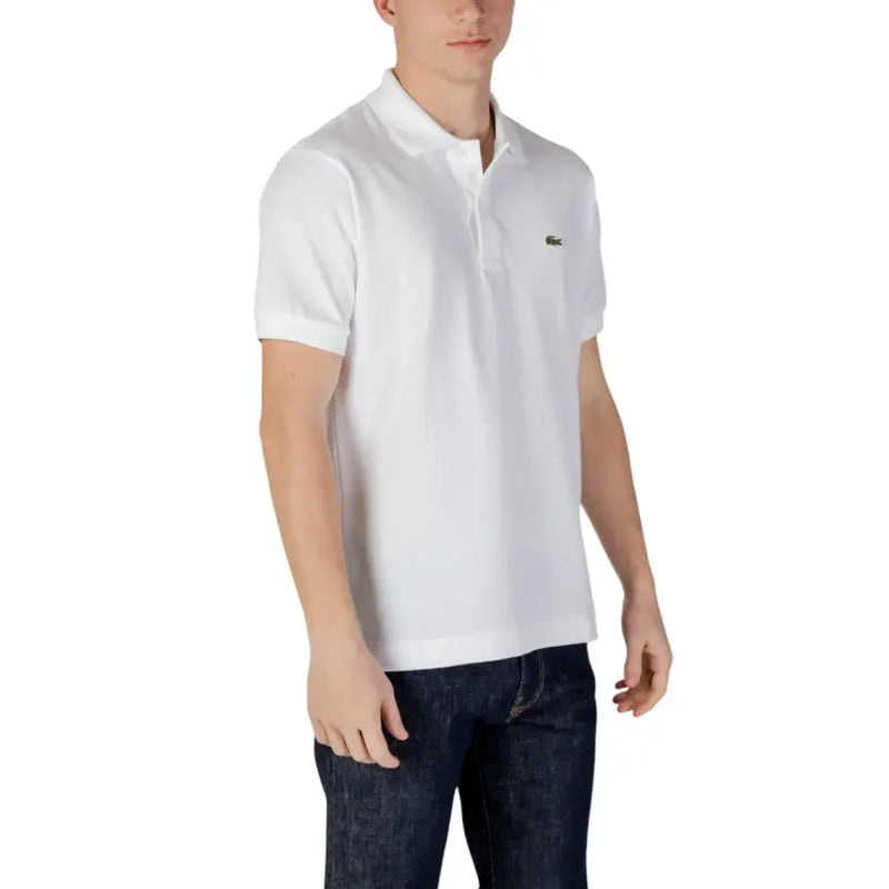 Lacoste white short sleeve polo shirt with classic collar and green crocodile logo on left chest in cotton material